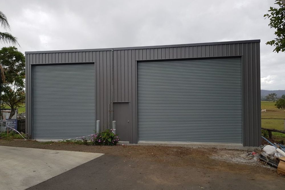 Steel shed with roller doors built by Franklin Constructions